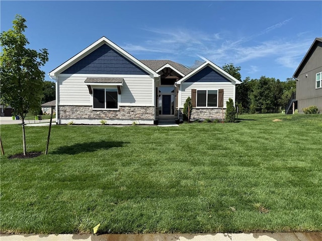 9301 SW Leviathan Ct, Lees Summit, MO 64064 - craftsman-style house featuring stone siding and a front lawn