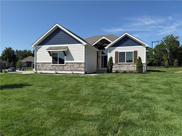 9301 SW Leviathan Ct, Lees Summit, MO 64064 - craftsman-style home featuring stone siding and a front yard