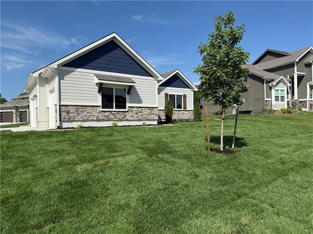 9301 SW Leviathan Ct, Lees Summit, MO 64064 - craftsman house featuring stone siding and a front yard
