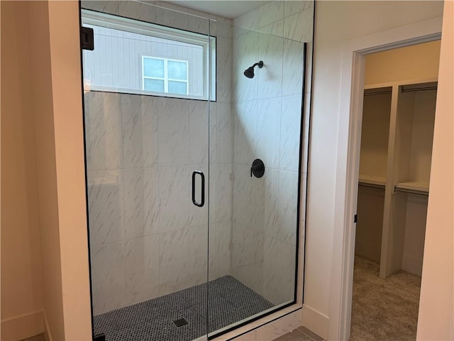9301 SW Leviathan Ct, Lees Summit, MO 64064 - bathroom with a stall shower and a spacious closet
