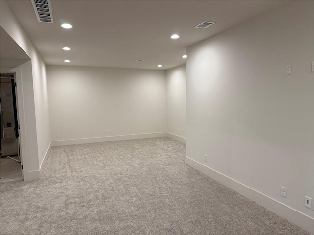 9301 SW Leviathan Ct, Lees Summit, MO 64064 - empty room featuring recessed lighting and carpet