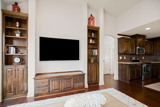 living room featuring dark wood-type flooring