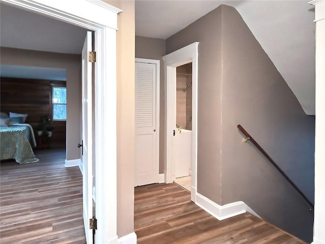 staircase featuring hardwood / wood-style floors