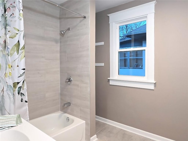 bathroom featuring tile patterned flooring, shower / bath combo, and a healthy amount of sunlight