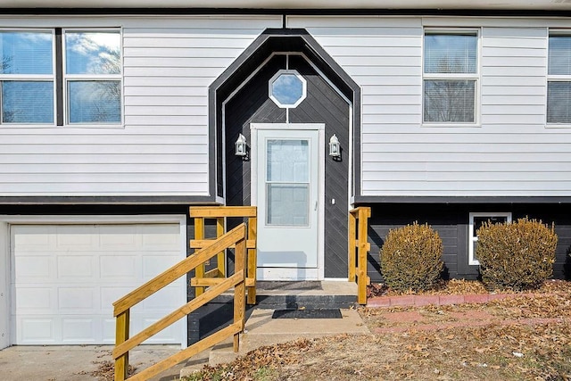 property entrance with a garage