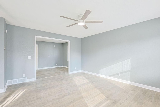 unfurnished room with light hardwood / wood-style floors and ceiling fan