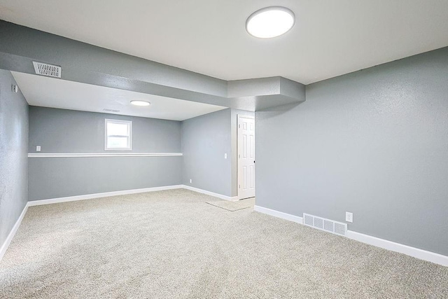 basement with light carpet