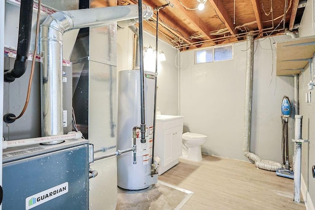 utility room featuring gas water heater