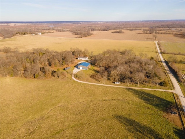 birds eye view of property featuring a rural view