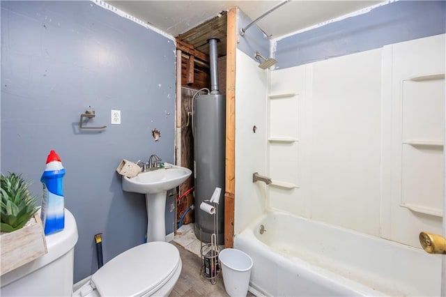 full bathroom featuring sink, toilet, bathing tub / shower combination, and water heater