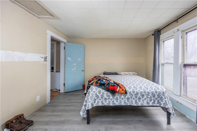 bedroom featuring hardwood / wood-style floors