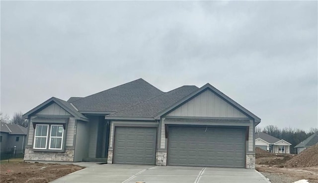 craftsman-style home with a garage