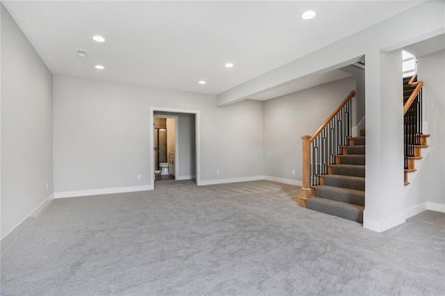 7050 NW Yulich Ct, Parkville, MO 64152 - below grade area with carpet, recessed lighting, and stairs