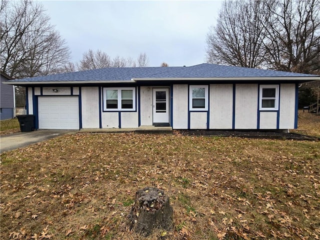 single story home with a garage