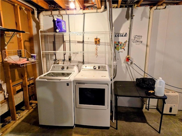 washroom featuring washer and dryer