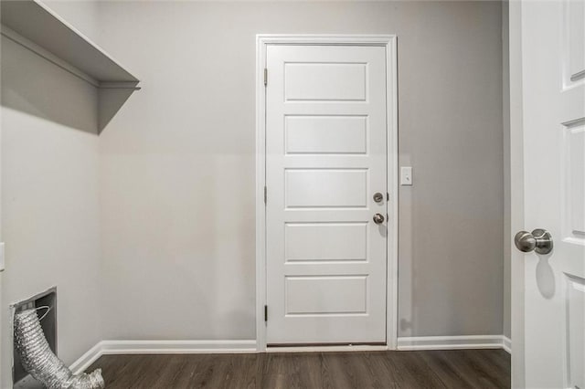 laundry area featuring dark hardwood / wood-style floors