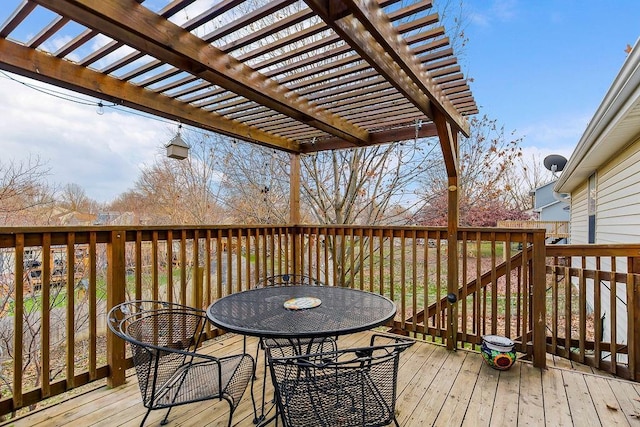 wooden terrace with a pergola