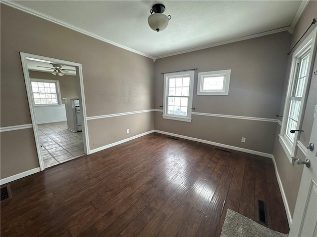 unfurnished room with ceiling fan, hardwood / wood-style flooring, and crown molding