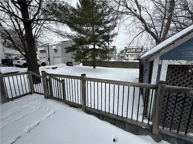 view of snow covered deck