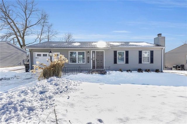 single story home featuring a garage