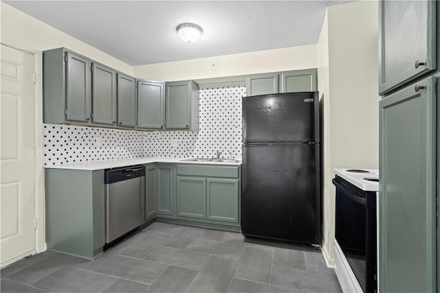 kitchen with stainless steel dishwasher, white electric range oven, and black refrigerator