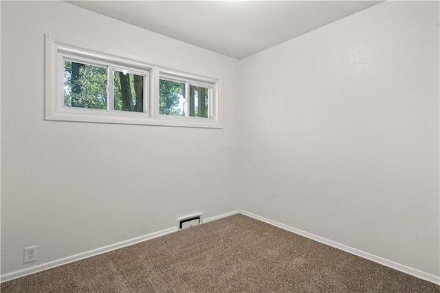 view of carpeted spare room