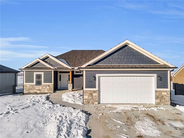 craftsman house with a garage