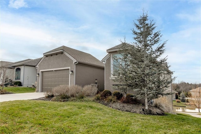 view of property exterior featuring a garage and a lawn