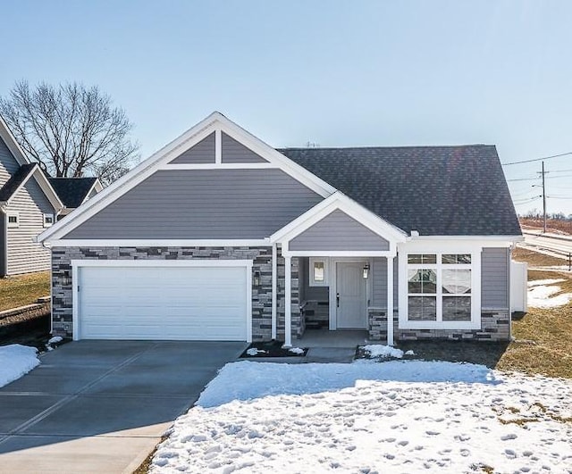 view of front of house featuring a porch and a garage