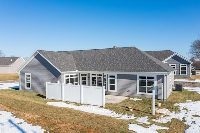 view of front facade with a yard and a patio area