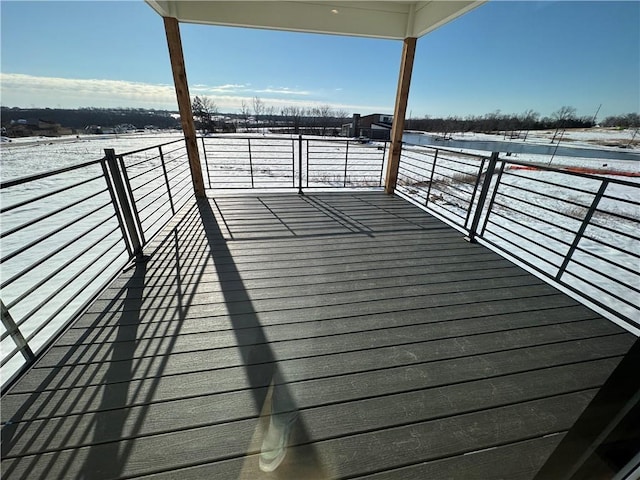 view of snow covered deck