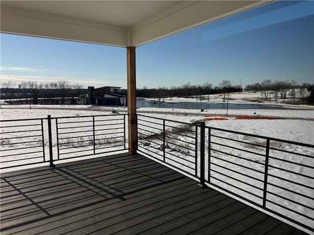 view of snow covered deck