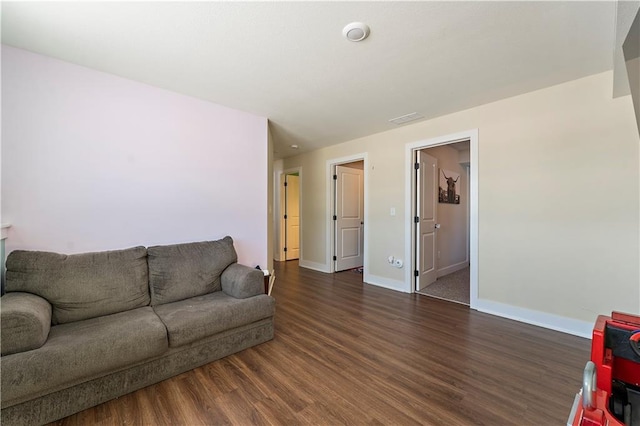 living room with dark wood-type flooring