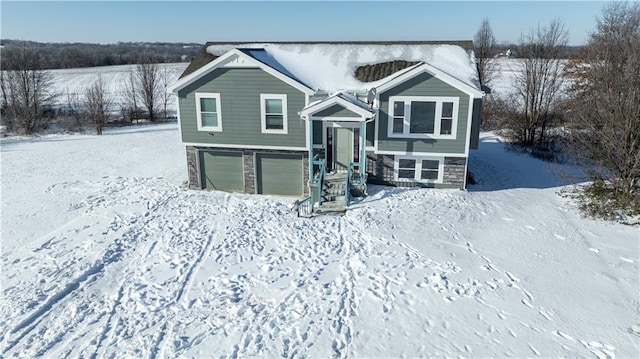 raised ranch with a garage