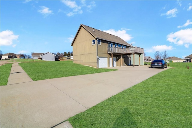 view of home's exterior featuring a yard and a garage