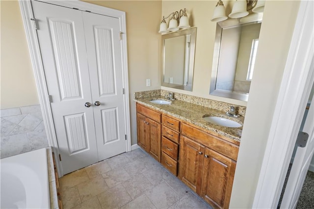 bathroom featuring a bathing tub and vanity