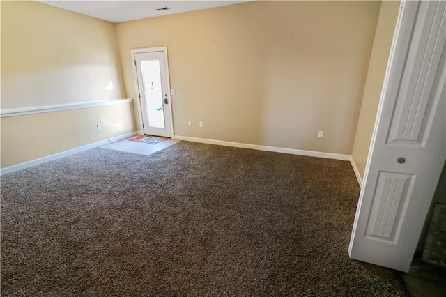 view of carpeted spare room