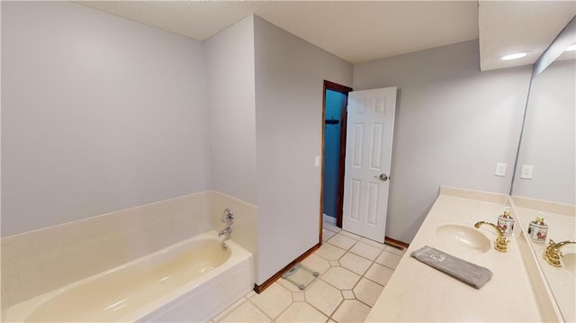 bathroom featuring a bath and vanity