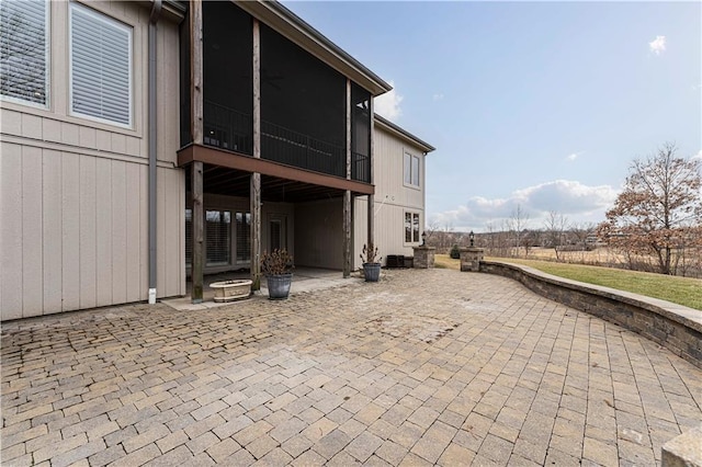 exterior space featuring a sunroom