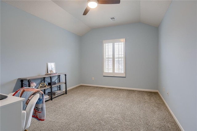 carpeted office space with lofted ceiling and ceiling fan