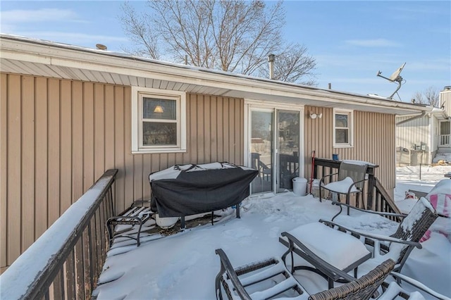 view of snow covered patio