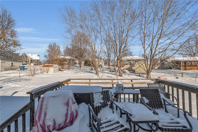 view of snow covered deck