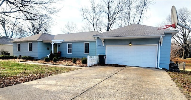 single story home featuring a garage