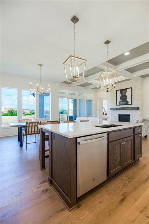 4218 W 158th Ter, Overland Park, KS 66224 - kitchen with dishwasher, a chandelier, coffered ceiling, healthy amount of natural light, and beamed ceiling