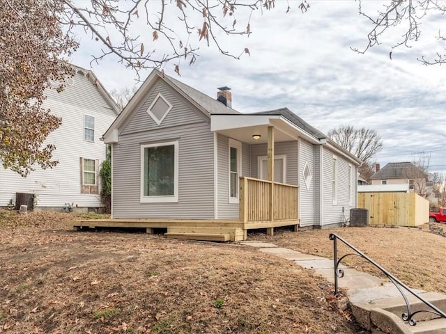 view of front of house featuring cooling unit