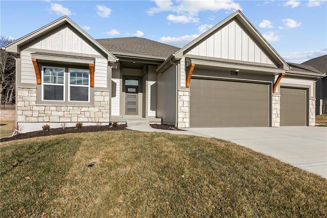 view of front of house with a garage and a front lawn