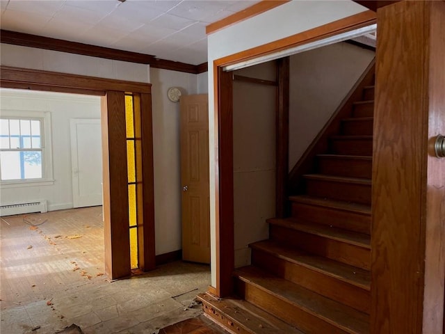 4512 Terrace St, Kansas City, MO 64111 - stairway featuring ornamental molding and a baseboard heating unit