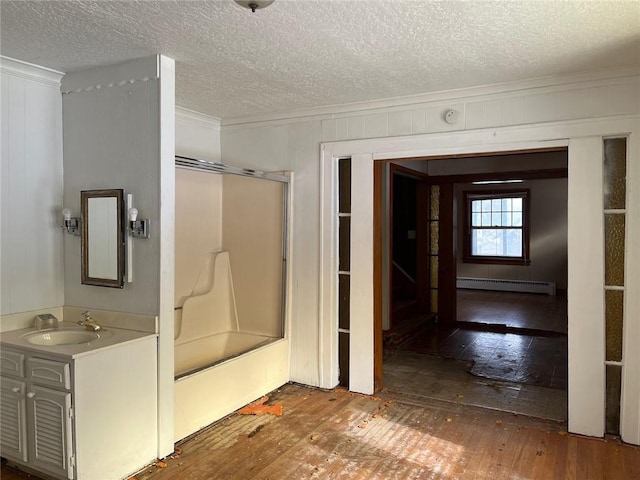 4512 Terrace St, Kansas City, MO 64111 - bathroom with hardwood / wood-style floors, wood walls, combined bath / shower with glass door, and a baseboard radiator