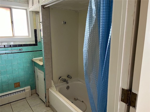 4512 Terrace St, Kansas City, MO 64111 - bathroom with shower / bath combo with shower curtain, tile patterned flooring, tile walls, and a baseboard heating unit
