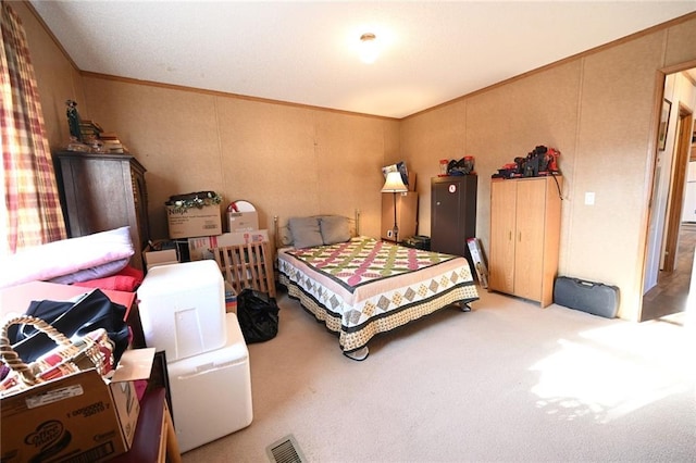 bedroom featuring light carpet